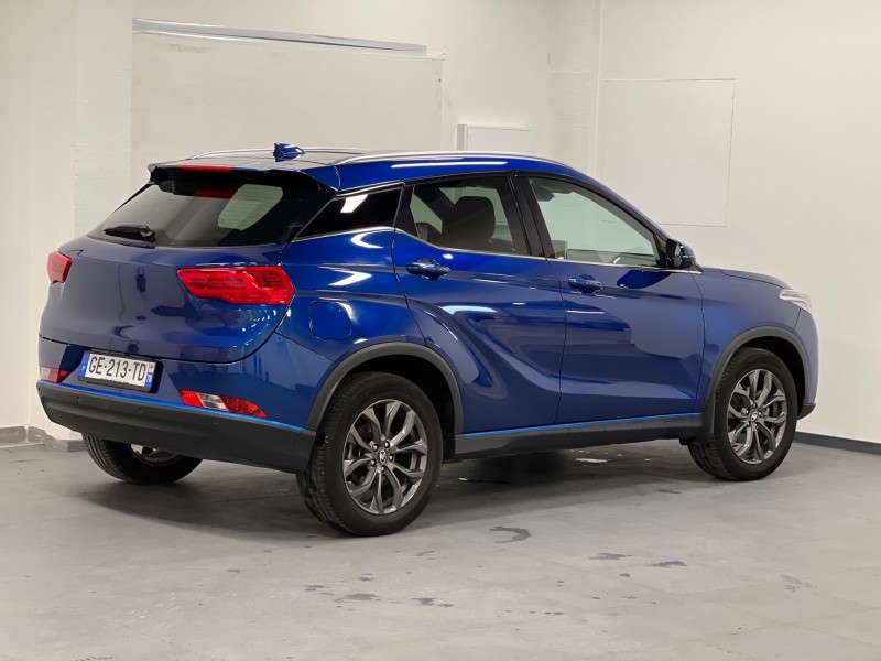 trouver un véhicule électrique SUV d'occasion avec bonne autonomie à Mantes La Ville - vue 3/4 arrière